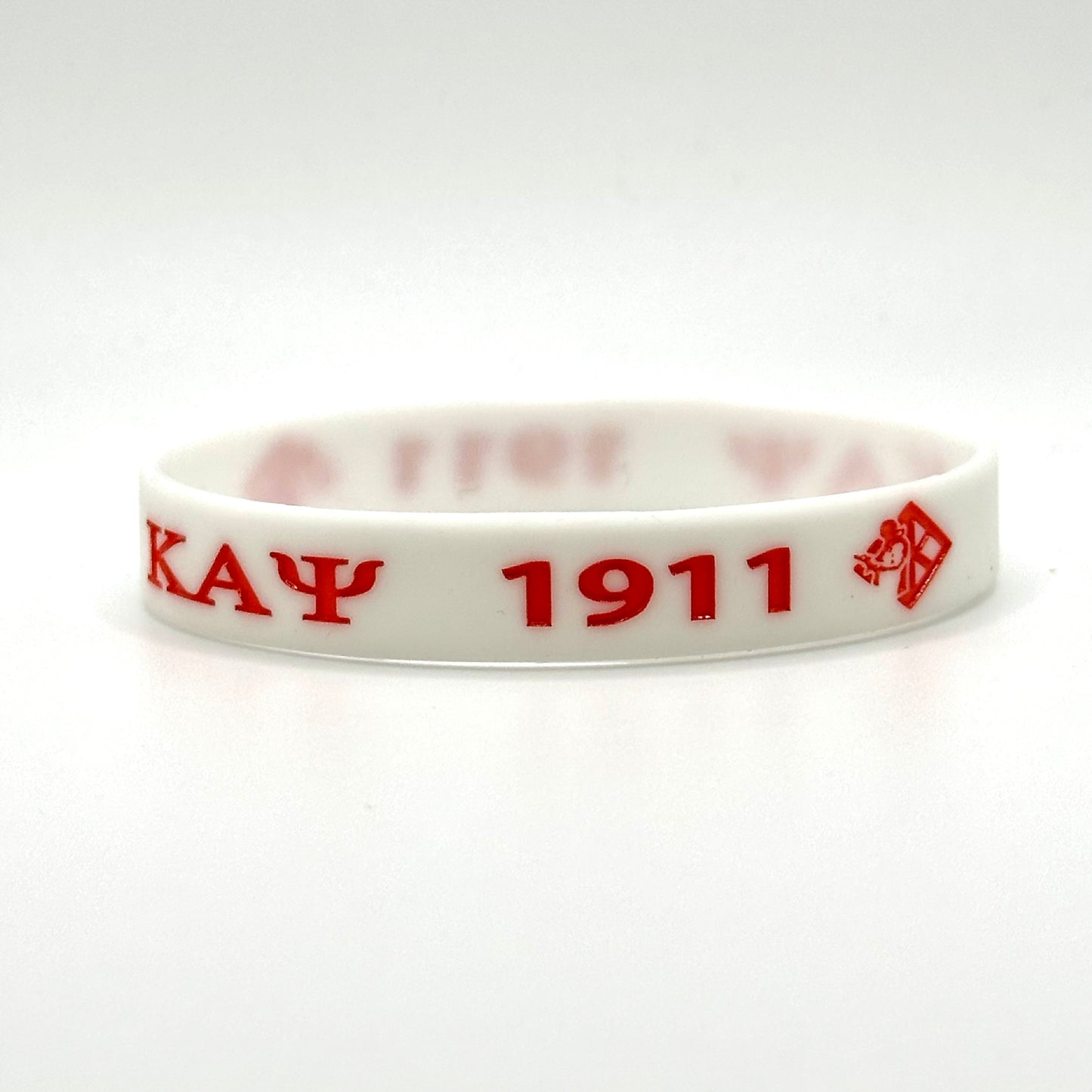 Kappa Alpha Psi white with red letters wristband